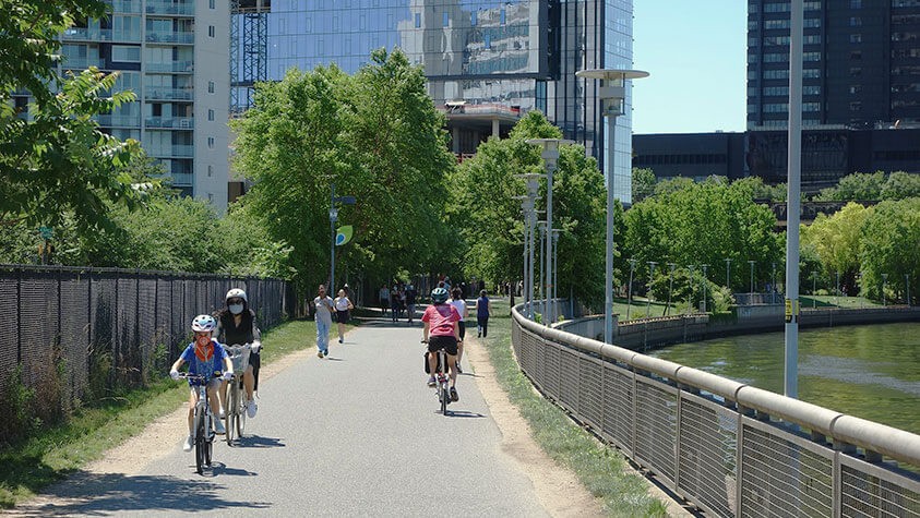 Cyclists, runners and walkers enjoy a day in the city on the East Coast Greenway.