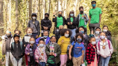 A group of black youth exploring the outdoors.